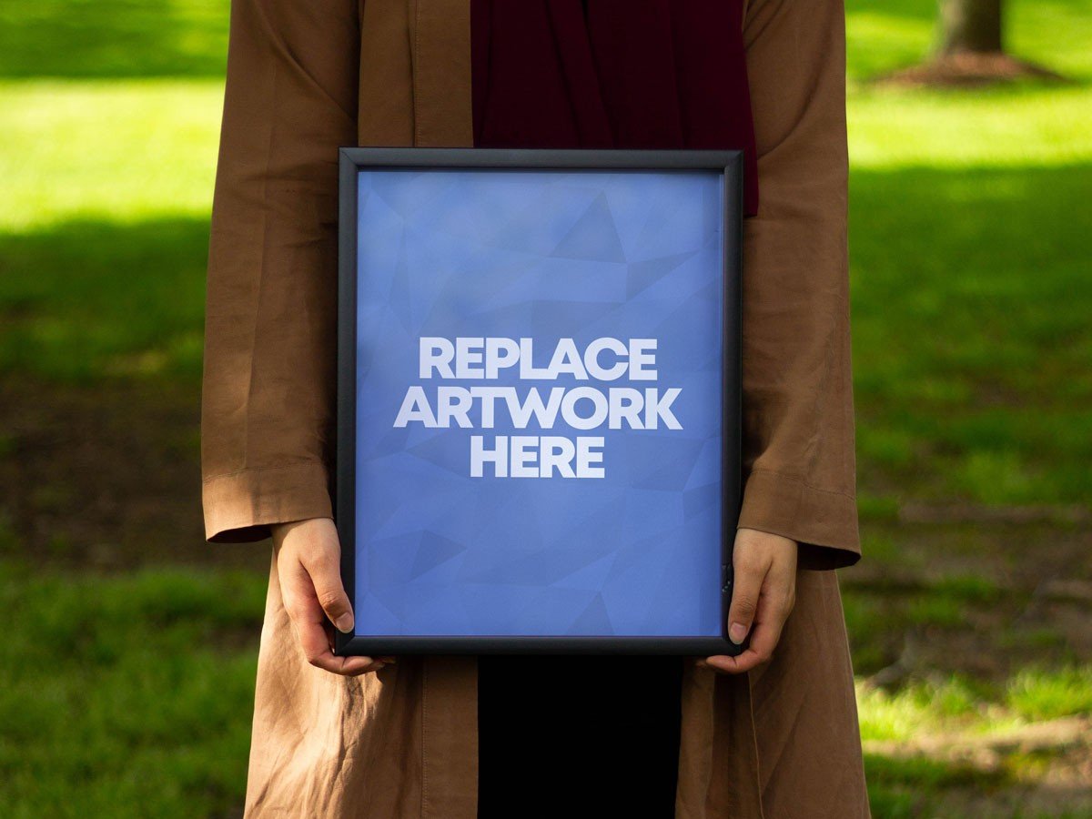 Holding Photo Poster Frame Mockup