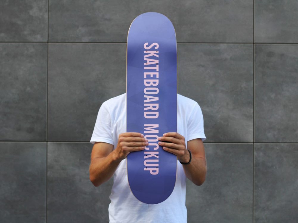 Download Man Holding Skateboard Mockup Mockup Love PSD Mockup Templates