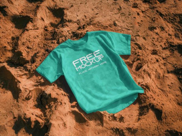 Tshirt in sand mockup  mockup, free mockup, psd mockup, mockup psd, free psd, psd, download mockup, mockup download, photoshop mockup, mock-up, free mock-up, mock-up psd, mockup template, free mockup psd, presentation mockup, branding mockup, free psd mockup